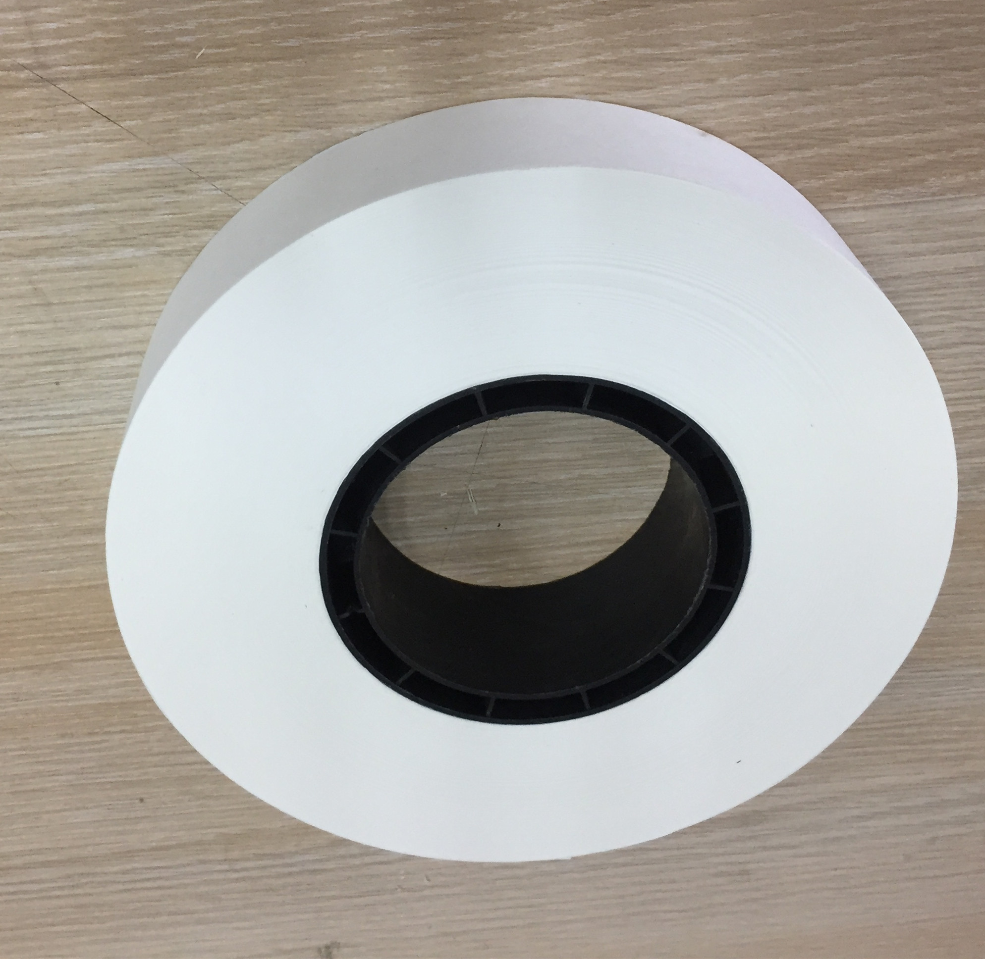 30mm wide 76mm diameter heat applied paper roll for smart currency binder use